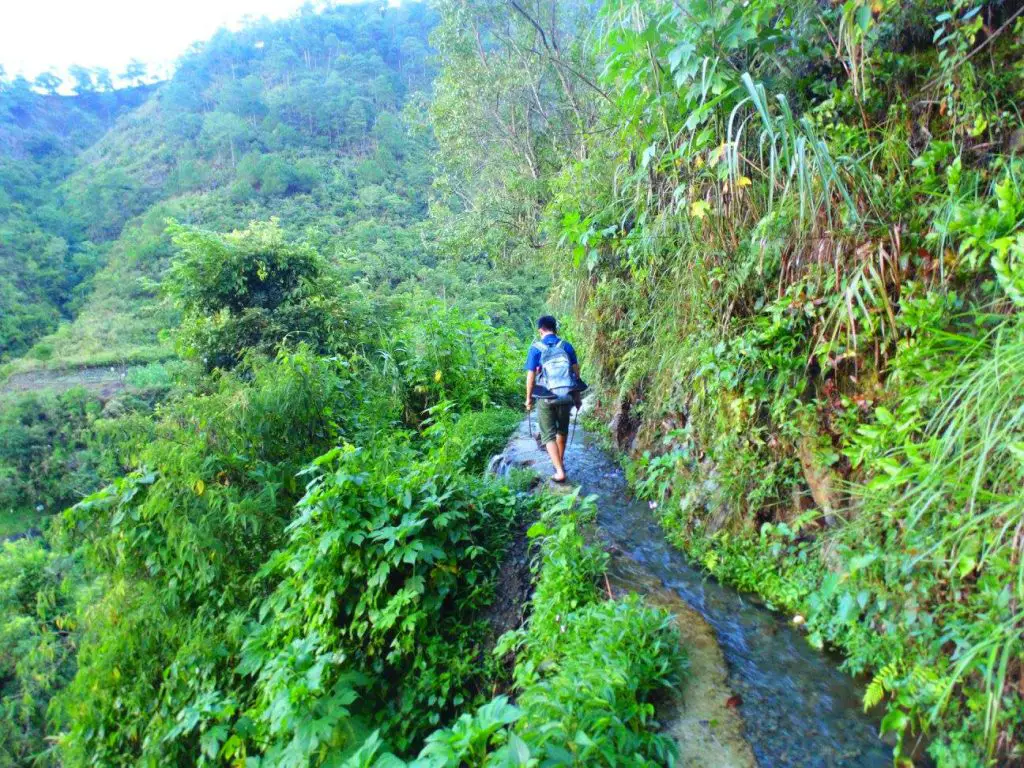 Following an irrigation canal to Humuyyo Falls.