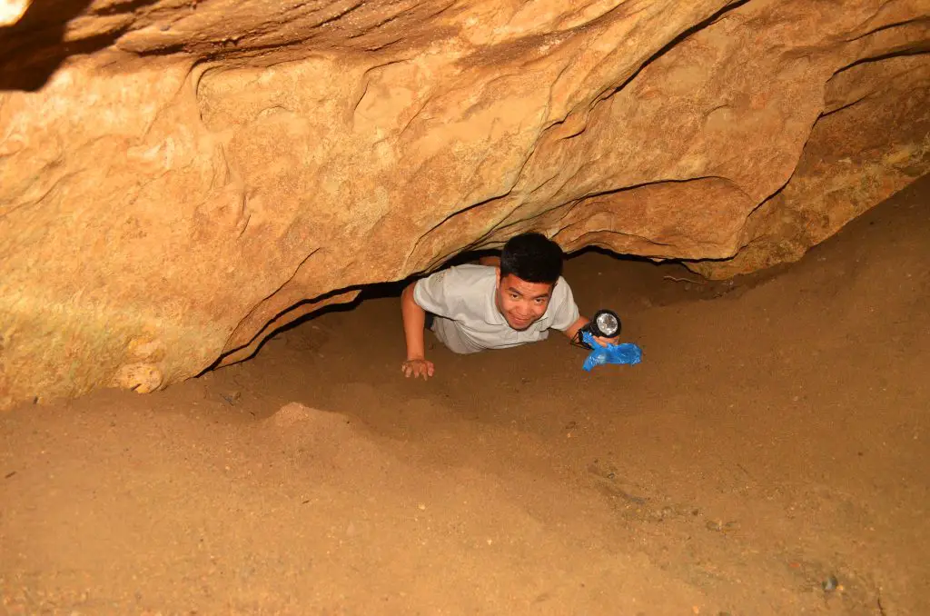 One of the narrow openings inside Longog cave.