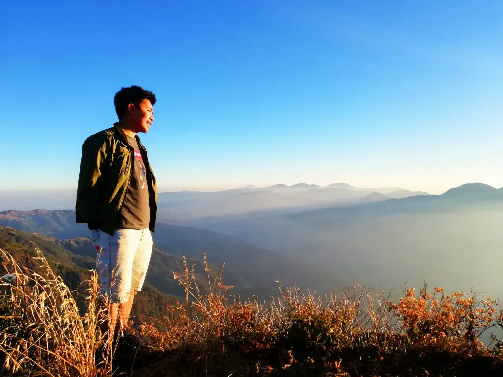 Relishing the entrancing view atop Mt. Timbak.