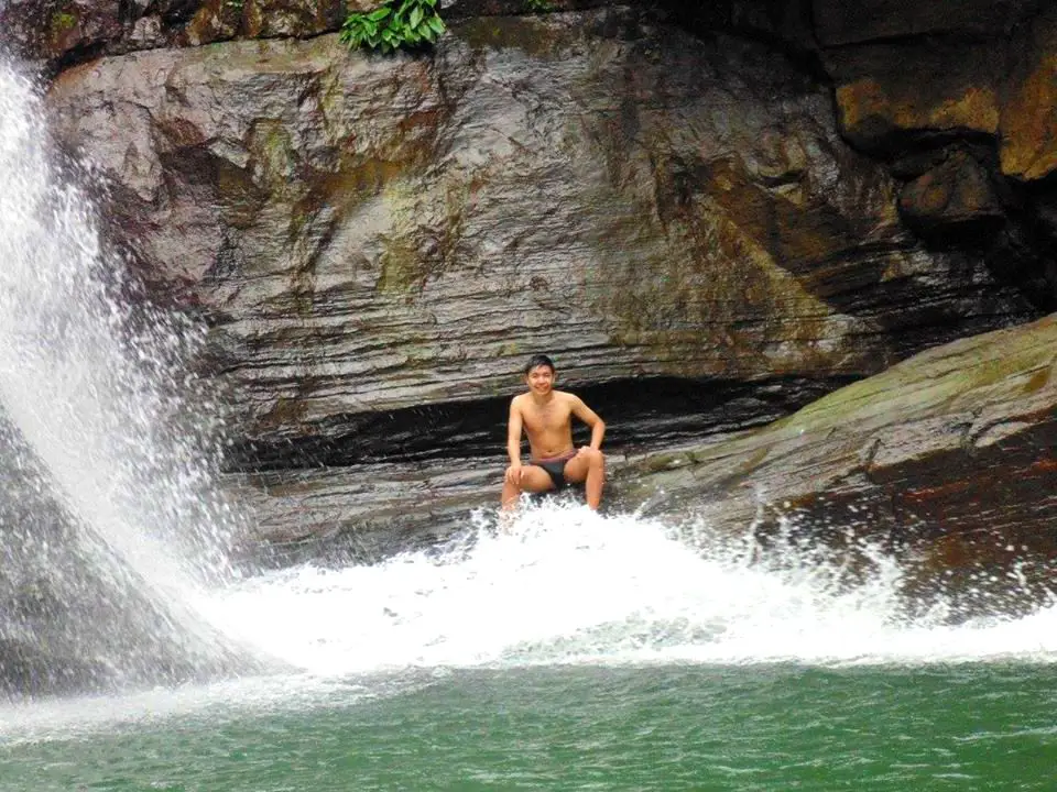 Sitting at the base of Towing Falls in Sablan, Benguet.